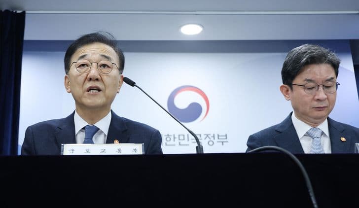 The land minister speaks at a government briefing.