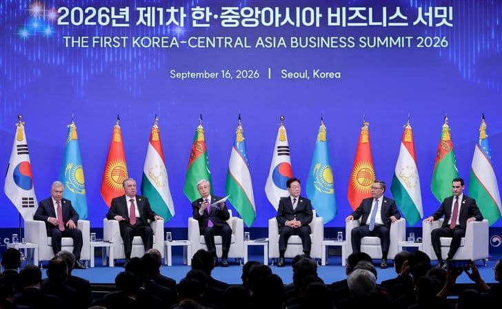 Leaders sit side by side on stage in front of national flags at the First Korea-Central Asia Business Summit 2026.