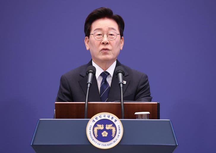 President Lee Jae-myung speaks at a podium reading The President of the Republic of Korea.